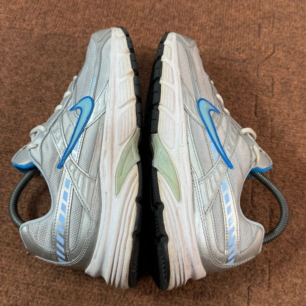Gently used Nike Initiator Metallic Silver Blue Running Shoes 394053-001 Women 9